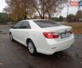 Білий Тойота Камрі, об'ємом двигуна 2.5 л та пробігом 280 тис. км за 12000 $, фото 1 на Automoto.ua