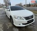 Белый Тойота Камри, объемом двигателя 2.5 л и пробегом 160 тыс. км за 11500 $, фото 1 на Automoto.ua