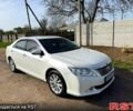 Белый Тойота Камри, объемом двигателя 2.5 л и пробегом 205 тыс. км за 8600 $, фото 1 на Automoto.ua