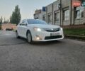 Белый Тойота Камри, объемом двигателя 2.49 л и пробегом 250 тыс. км за 10600 $, фото 1 на Automoto.ua
