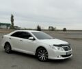 Белый Тойота Камри, объемом двигателя 2.5 л и пробегом 206 тыс. км за 11900 $, фото 1 на Automoto.ua