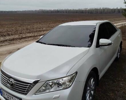 Білий Тойота Камрі, об'ємом двигуна 2.5 л та пробігом 196 тис. км за 11750 $, фото 1 на Automoto.ua