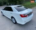Білий Тойота Камрі, об'ємом двигуна 2.5 л та пробігом 147 тис. км за 15350 $, фото 1 на Automoto.ua