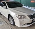 Белый Тойота Камри, объемом двигателя 2.49 л и пробегом 136 тыс. км за 13400 $, фото 1 на Automoto.ua