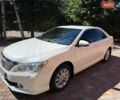 Белый Тойота Камри, объемом двигателя 2.5 л и пробегом 159 тыс. км за 14900 $, фото 1 на Automoto.ua