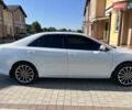 Белый Тойота Камри, объемом двигателя 2.5 л и пробегом 174 тыс. км за 13500 $, фото 2 на Automoto.ua