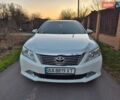 Белый Тойота Камри, объемом двигателя 2.49 л и пробегом 202 тыс. км за 12900 $, фото 1 на Automoto.ua