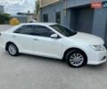 Белый Тойота Камри, объемом двигателя 2.5 л и пробегом 220 тыс. км за 15450 $, фото 1 на Automoto.ua