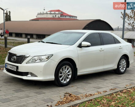 Белый Тойота Камри, объемом двигателя 2.49 л и пробегом 106 тыс. км за 12700 $, фото 1 на Automoto.ua