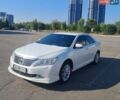 Белый Тойота Камри, объемом двигателя 2.5 л и пробегом 233 тыс. км за 9300 $, фото 1 на Automoto.ua
