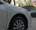 Белый Тойота Камри, объемом двигателя 2.49 л и пробегом 260 тыс. км за 14200 $, фото 1 на Automoto.ua