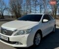 Белый Тойота Камри, объемом двигателя 2.49 л и пробегом 196 тыс. км за 13800 $, фото 11 на Automoto.ua
