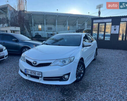 Белый Тойота Камри, объемом двигателя 2.5 л и пробегом 170 тыс. км за 11200 $, фото 1 на Automoto.ua