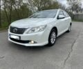 Белый Тойота Камри, объемом двигателя 2.5 л и пробегом 206 тыс. км за 12500 $, фото 1 на Automoto.ua