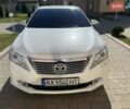 Белый Тойота Камри, объемом двигателя 2.5 л и пробегом 174 тыс. км за 13500 $, фото 3 на Automoto.ua