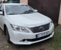 Белый Тойота Камри, объемом двигателя 2.5 л и пробегом 325 тыс. км за 8000 $, фото 1 на Automoto.ua