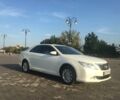 Белый Тойота Камри, объемом двигателя 2.5 л и пробегом 115 тыс. км за 19000 $, фото 1 на Automoto.ua