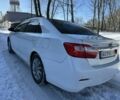 Белый Тойота Камри, объемом двигателя 2.5 л и пробегом 234 тыс. км за 11999 $, фото 2 на Automoto.ua