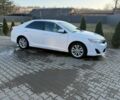 Белый Тойота Камри, объемом двигателя 2.5 л и пробегом 75 тыс. км за 13950 $, фото 1 на Automoto.ua