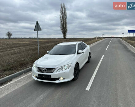 Белый Тойота Камри, объемом двигателя 2.5 л и пробегом 198 тыс. км за 13500 $, фото 3 на Automoto.ua