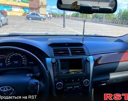 Белый Тойота Камри, объемом двигателя 2.5 л и пробегом 142 тыс. км за 14500 $, фото 8 на Automoto.ua