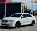Белый Тойота Камри, объемом двигателя 2.49 л и пробегом 155 тыс. км за 16000 $, фото 1 на Automoto.ua