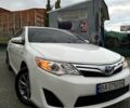 Белый Тойота Камри, объемом двигателя 2.5 л и пробегом 290 тыс. км за 13500 $, фото 1 на Automoto.ua