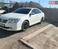 Белый Тойота Камри, объемом двигателя 2.49 л и пробегом 216 тыс. км за 12999 $, фото 1 на Automoto.ua
