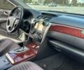 Белый Тойота Камри, объемом двигателя 2.5 л и пробегом 249 тыс. км за 13950 $, фото 5 на Automoto.ua