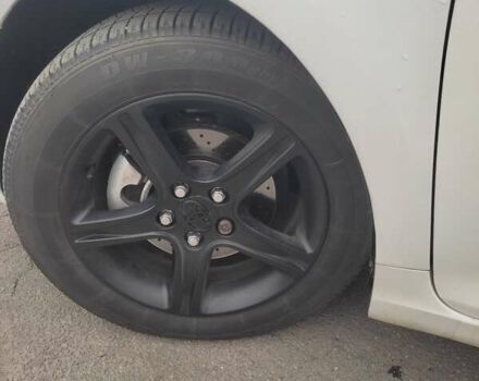 Белый Тойота Камри, объемом двигателя 2.4 л и пробегом 297 тыс. км за 10000 $, фото 5 на Automoto.ua