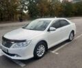 Белый Тойота Камри, объемом двигателя 2.5 л и пробегом 248 тыс. км за 12650 $, фото 1 на Automoto.ua