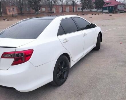 Белый Тойота Камри, объемом двигателя 2.4 л и пробегом 297 тыс. км за 10000 $, фото 9 на Automoto.ua