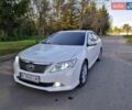 Белый Тойота Камри, объемом двигателя 2.49 л и пробегом 128 тыс. км за 12500 $, фото 1 на Automoto.ua
