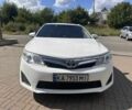 Белый Тойота Камри, объемом двигателя 2.5 л и пробегом 160 тыс. км за 13367 $, фото 1 на Automoto.ua
