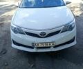 Білий Тойота Камрі, об'ємом двигуна 2.5 л та пробігом 138 тис. км за 11533 $, фото 1 на Automoto.ua