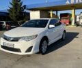 Белый Тойота Камри, объемом двигателя 2.49 л и пробегом 260 тыс. км за 12300 $, фото 1 на Automoto.ua