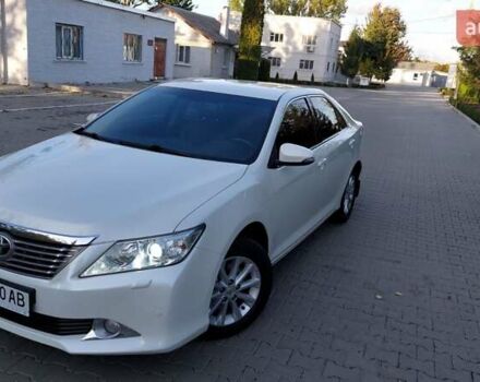 Белый Тойота Камри, объемом двигателя 2.5 л и пробегом 191 тыс. км за 14800 $, фото 2 на Automoto.ua