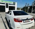 Белый Тойота Камри, объемом двигателя 2.5 л и пробегом 220 тыс. км за 11500 $, фото 1 на Automoto.ua