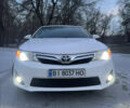 Белый Тойота Камри, объемом двигателя 2.5 л и пробегом 190 тыс. км за 13400 $, фото 1 на Automoto.ua