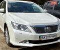 Белый Тойота Камри, объемом двигателя 2.49 л и пробегом 126 тыс. км за 15000 $, фото 1 на Automoto.ua