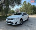 Белый Тойота Камри, объемом двигателя 2.5 л и пробегом 201 тыс. км за 7799 $, фото 1 на Automoto.ua