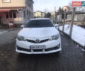 Белый Тойота Камри, объемом двигателя 2.49 л и пробегом 161 тыс. км за 13000 $, фото 1 на Automoto.ua