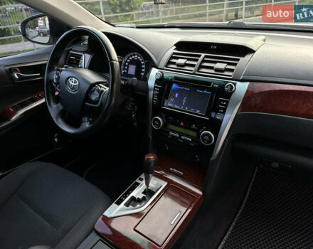 Білий Тойота Камрі, об'ємом двигуна 2.49 л та пробігом 315 тис. км за 12999 $, фото 13 на Automoto.ua