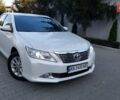 Белый Тойота Камри, объемом двигателя 2.5 л и пробегом 191 тыс. км за 14800 $, фото 1 на Automoto.ua