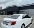 Белый Тойота Камри, объемом двигателя 2.5 л и пробегом 175 тыс. км за 13800 $, фото 1 на Automoto.ua