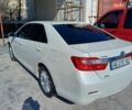 Белый Тойота Камри, объемом двигателя 2.49 л и пробегом 118 тыс. км за 16000 $, фото 1 на Automoto.ua