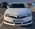 Белый Тойота Камри, объемом двигателя 2 л и пробегом 170 тыс. км за 13000 $, фото 1 на Automoto.ua