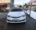 Белый Тойота Камри, объемом двигателя 2.49 л и пробегом 161 тыс. км за 12300 $, фото 1 на Automoto.ua