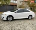 Белый Тойота Камри, объемом двигателя 2.5 л и пробегом 188 тыс. км за 10900 $, фото 1 на Automoto.ua