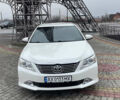 Белый Тойота Камри, объемом двигателя 2.5 л и пробегом 205 тыс. км за 14500 $, фото 1 на Automoto.ua